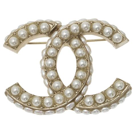 chanel faux pearl brooch|chanel brooch price.